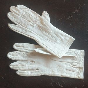 YSL cream colored leather gloves  size 7 1/2